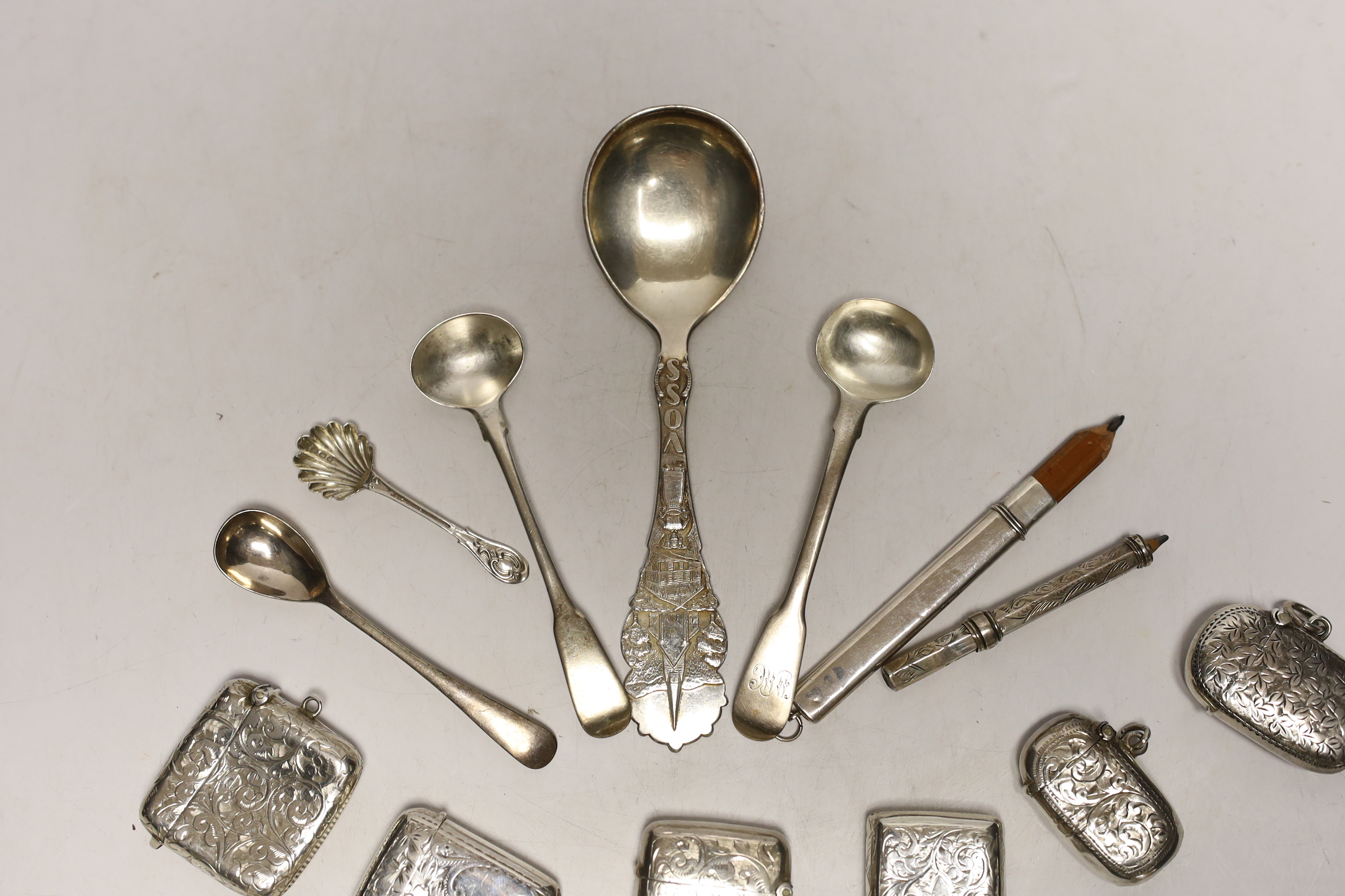 Six assorted early 20th century silver vesta cases, largest 45mm and a small quantity of sundry items including silver condiment spoons and two pencils.